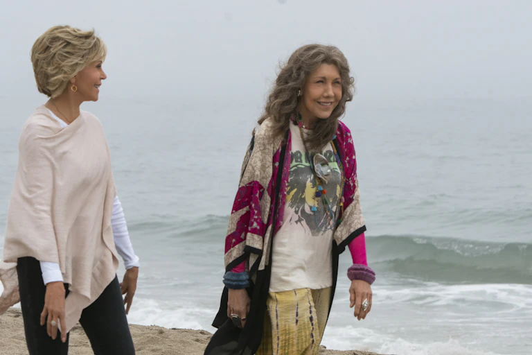 Grace and Frankie on a beach