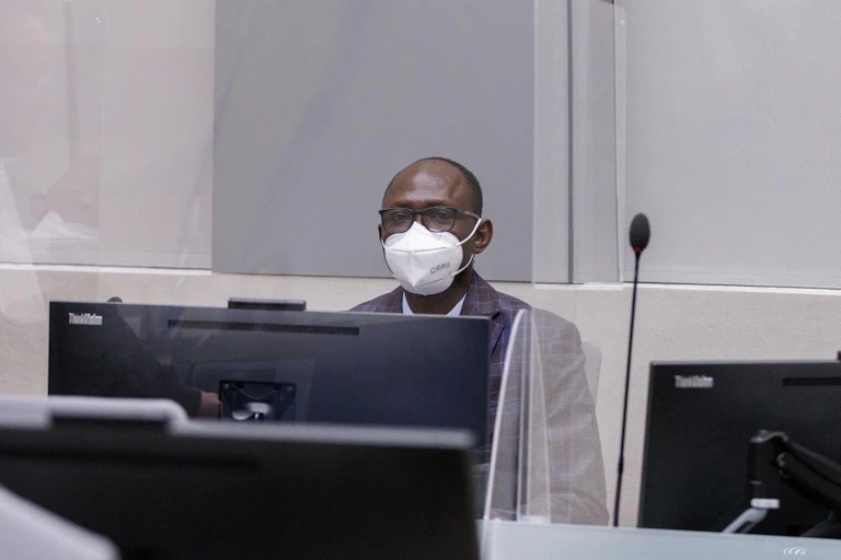 A man suit and wearing facemask