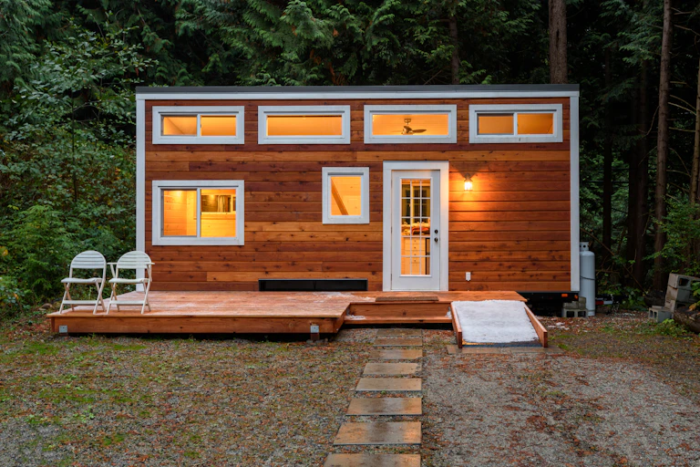 A tiny house at dusk