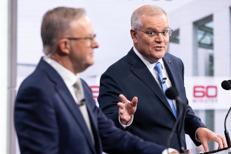 Morrison and Albanese debating on stage