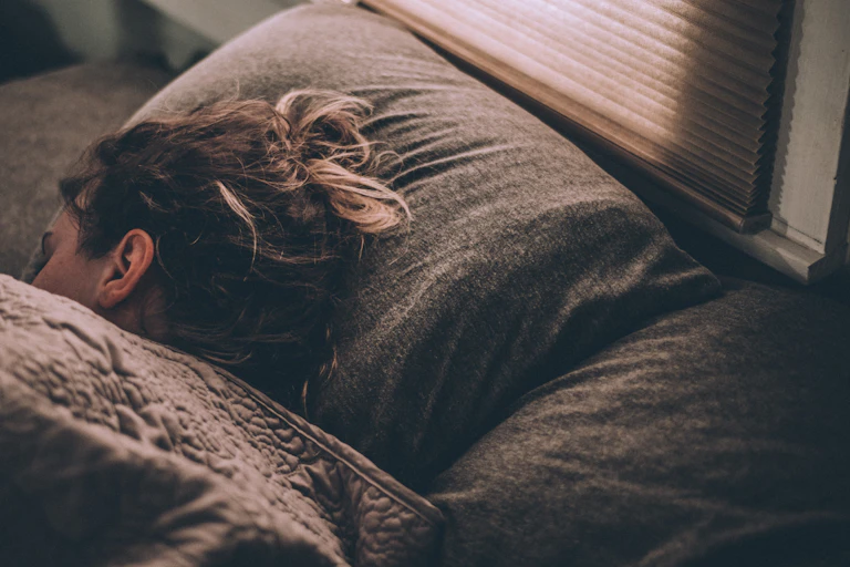 Person sleeps on side