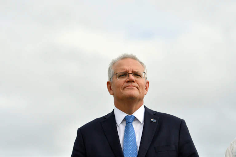 Scott Morrison greets Emmanuel Macron at the G20.