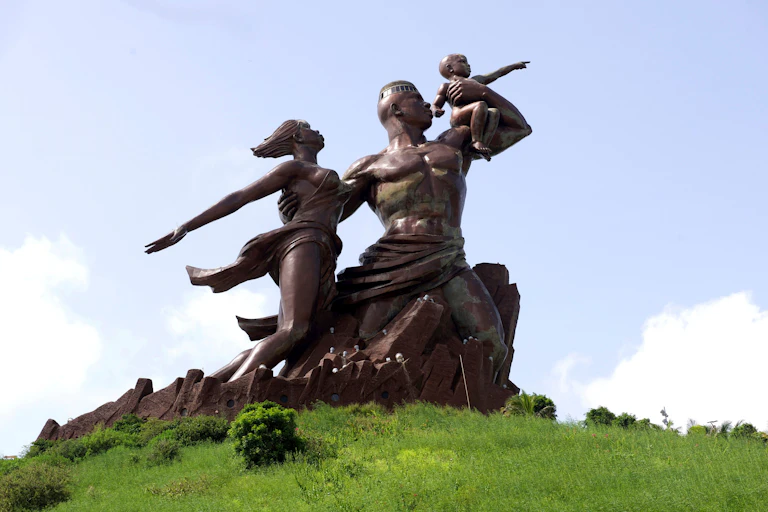 A statue of a man, woman and child