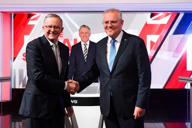 Prime Minister Scott Morrison and Opposition Leader Anthony Albanese shaking hands at the third and final leaders' debate
