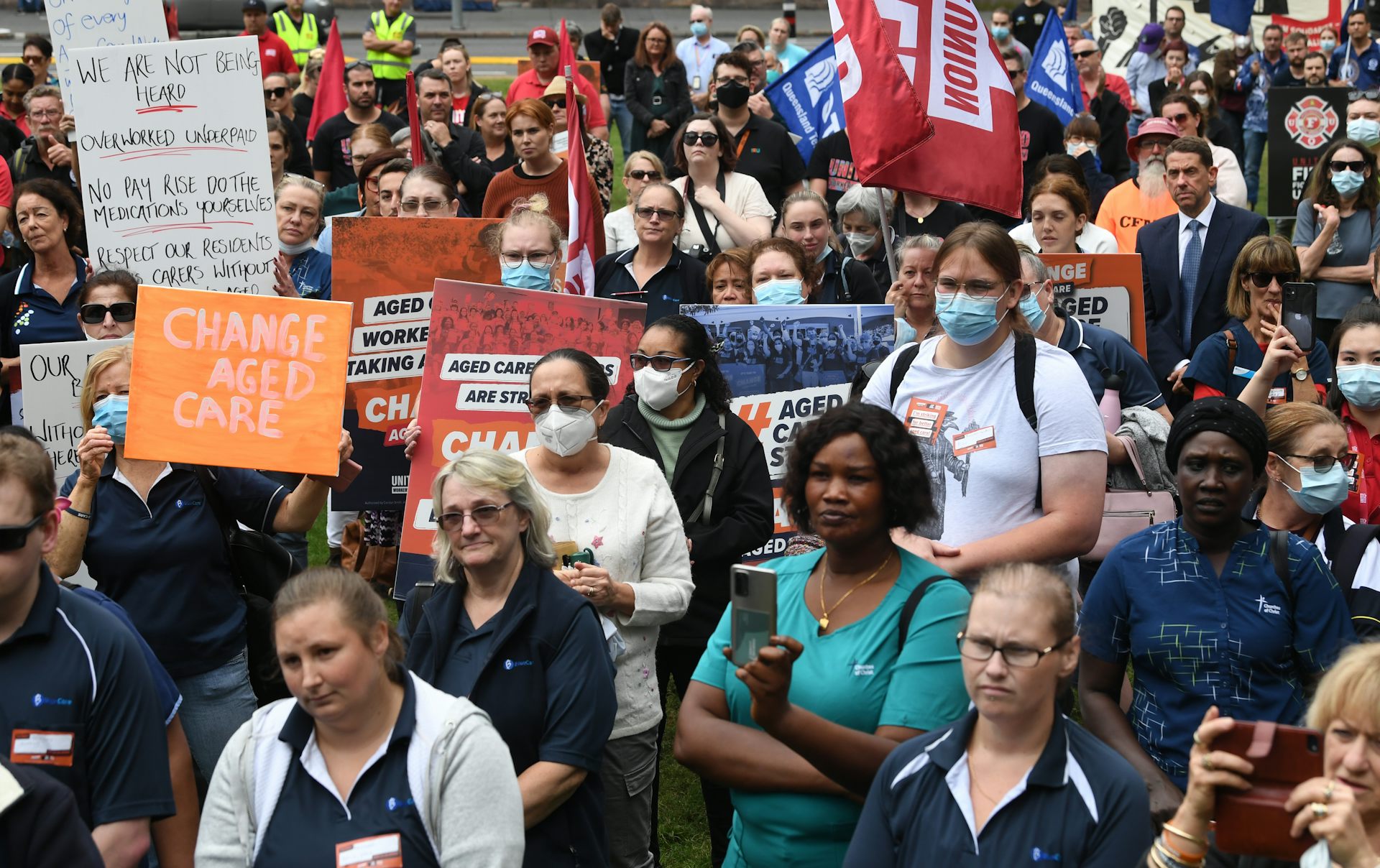 Striking aged care workers rally in Brisbane for better pay and staffing levels on Tuesday, May 10 2022.