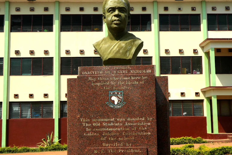 A bronze rendering of Kwame Nkrumah at a high school.