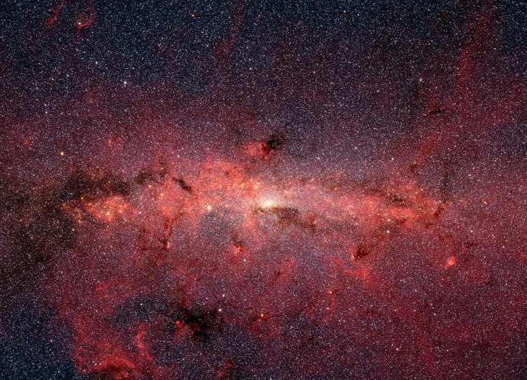 A red mass of gas and stars at the center of the Milky Way.