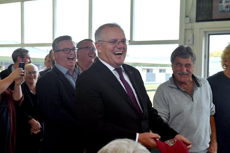 Group of men laughing