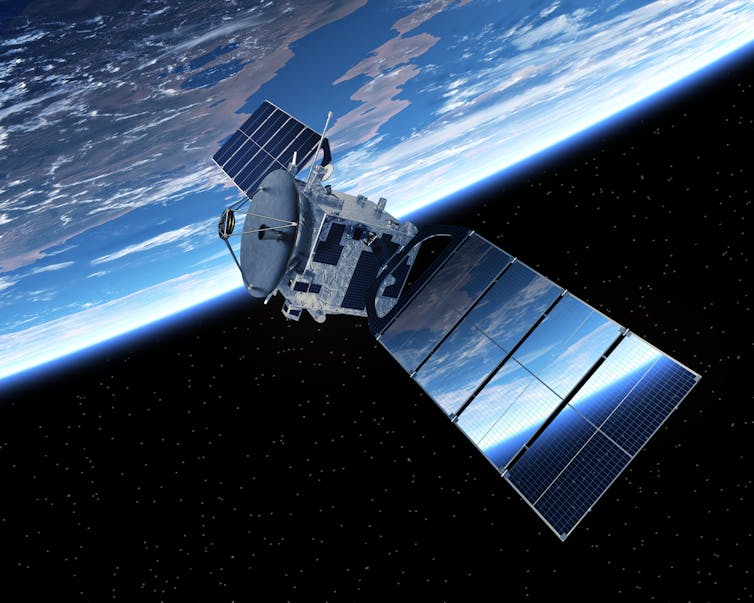 A satellite in space orbits Earth (visible in the background)