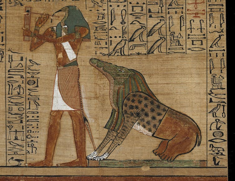 Drawing of Egyptian gods on papyrus.