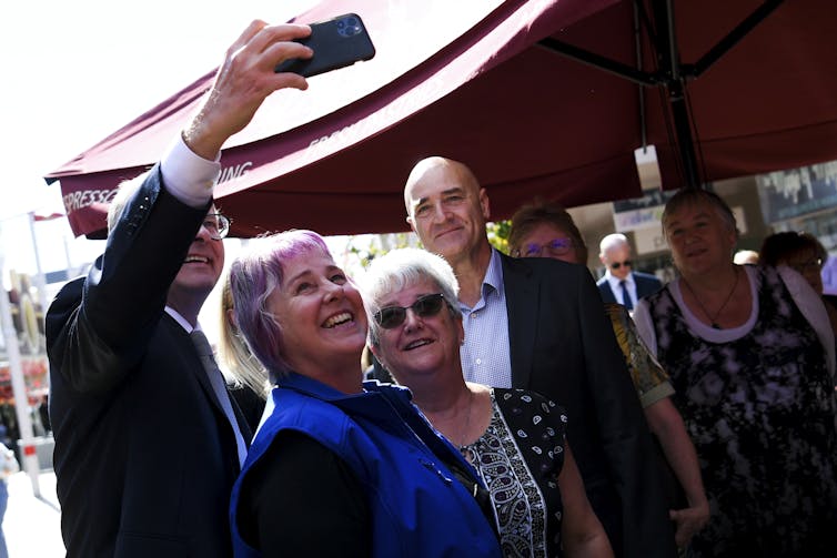 Albanese takes a selfie with nurses