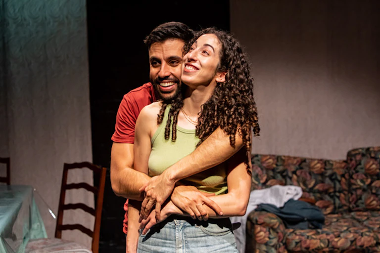 A man and a woman hug