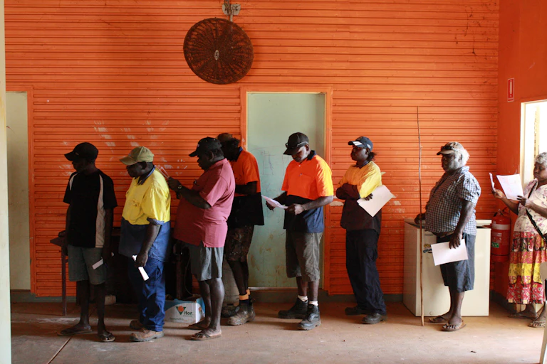 First Nations people line up to vote at South Bathurst Island.