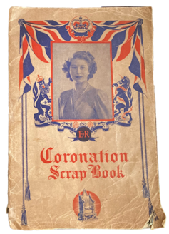 Front cover of a coronation scrapbook featuring a picture of young Queen Elizabeth II.