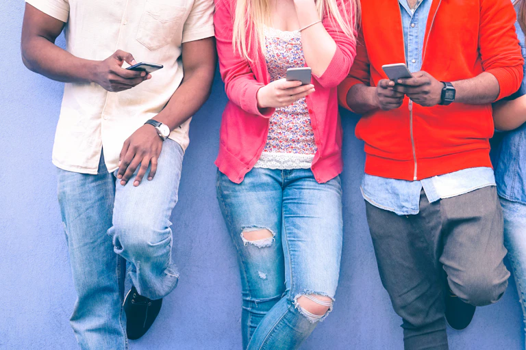 People looking at their phones.