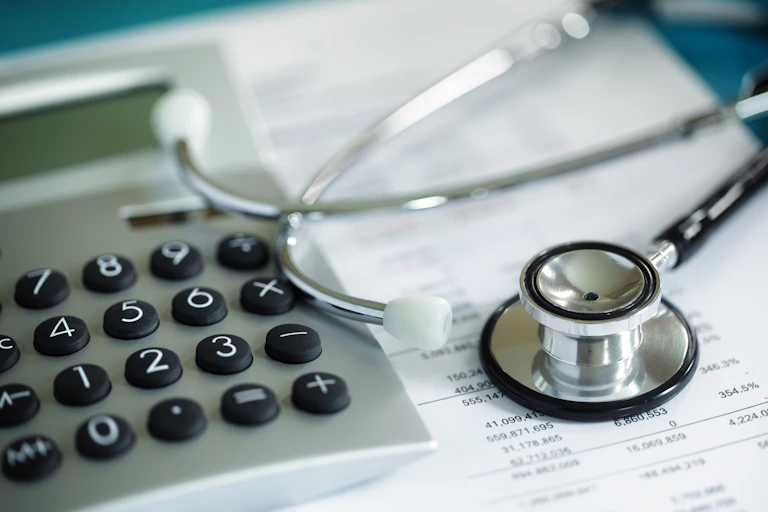 calculator and stethoscope