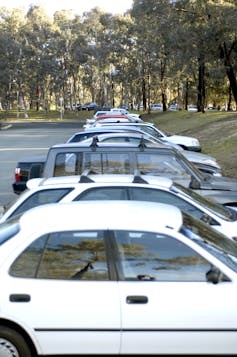 Cars in a car park.