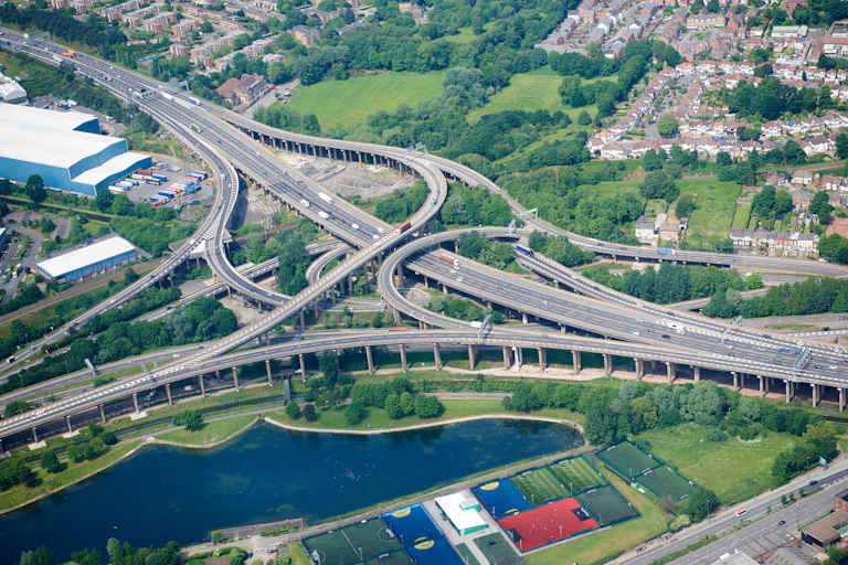 An overhead shot of a multilane elevated highway junction.
