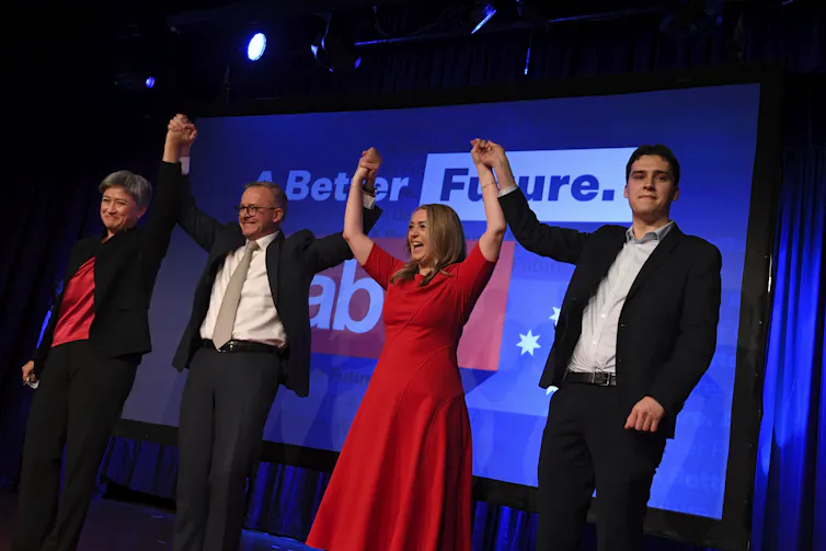 Penny Wong, Anthony Albanese and his family celebrate Labor's election win.