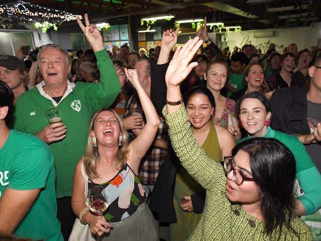 Greens supporters party on election night.