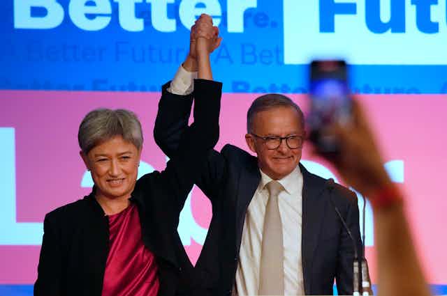 Penny Wong and Anthony Albanese celebrate on election night