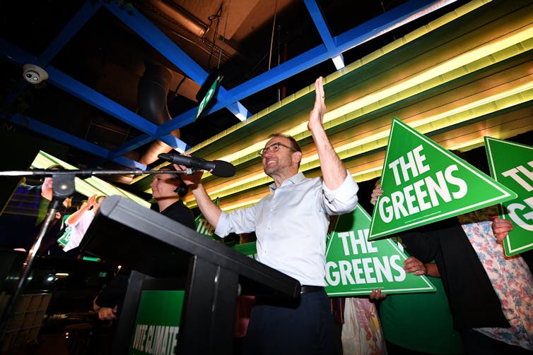 Greens leader Adam Bandt celebrates election night.