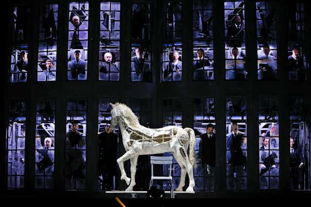A fake white horse on stage