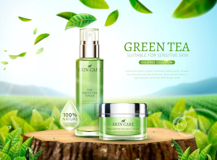 A green-focused skincare advert with a bottle and tub placed on top of a tree stump and surrounded by leaves