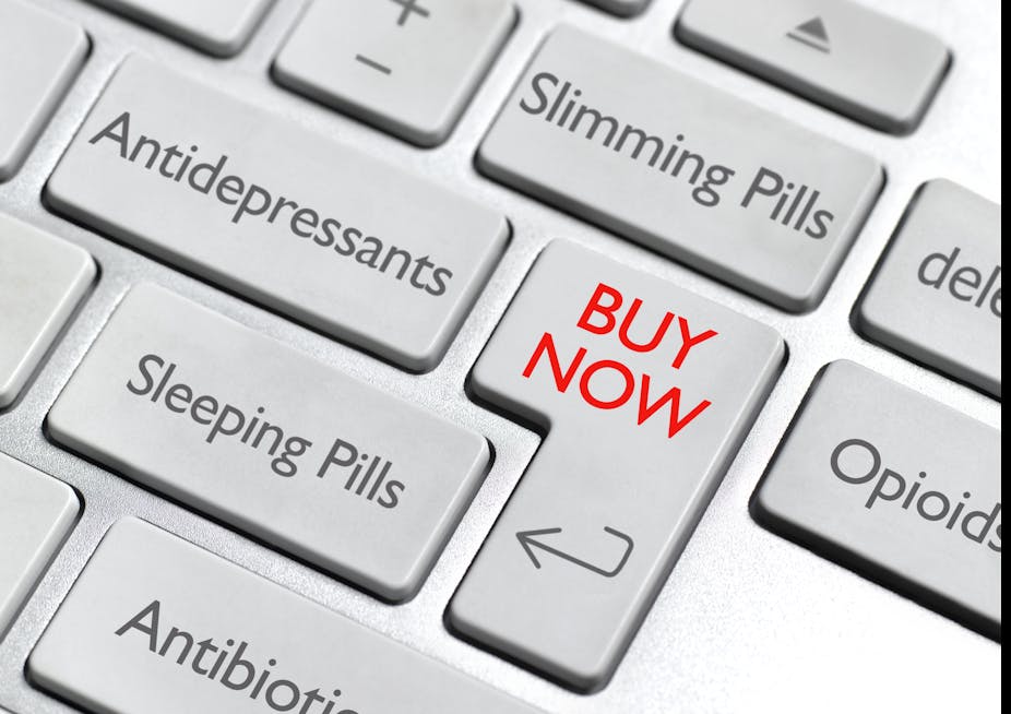 A keyboard display with keys that say the names of common types of drugs such as antidepressants and sleeping pills, alongside a key that says "Buy Now" in red font.