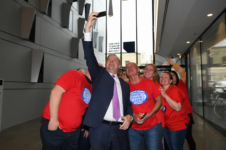 Anthony Albanese takes a selfie with members of the Australian Nursing and Midwifery Federation in November 2019.