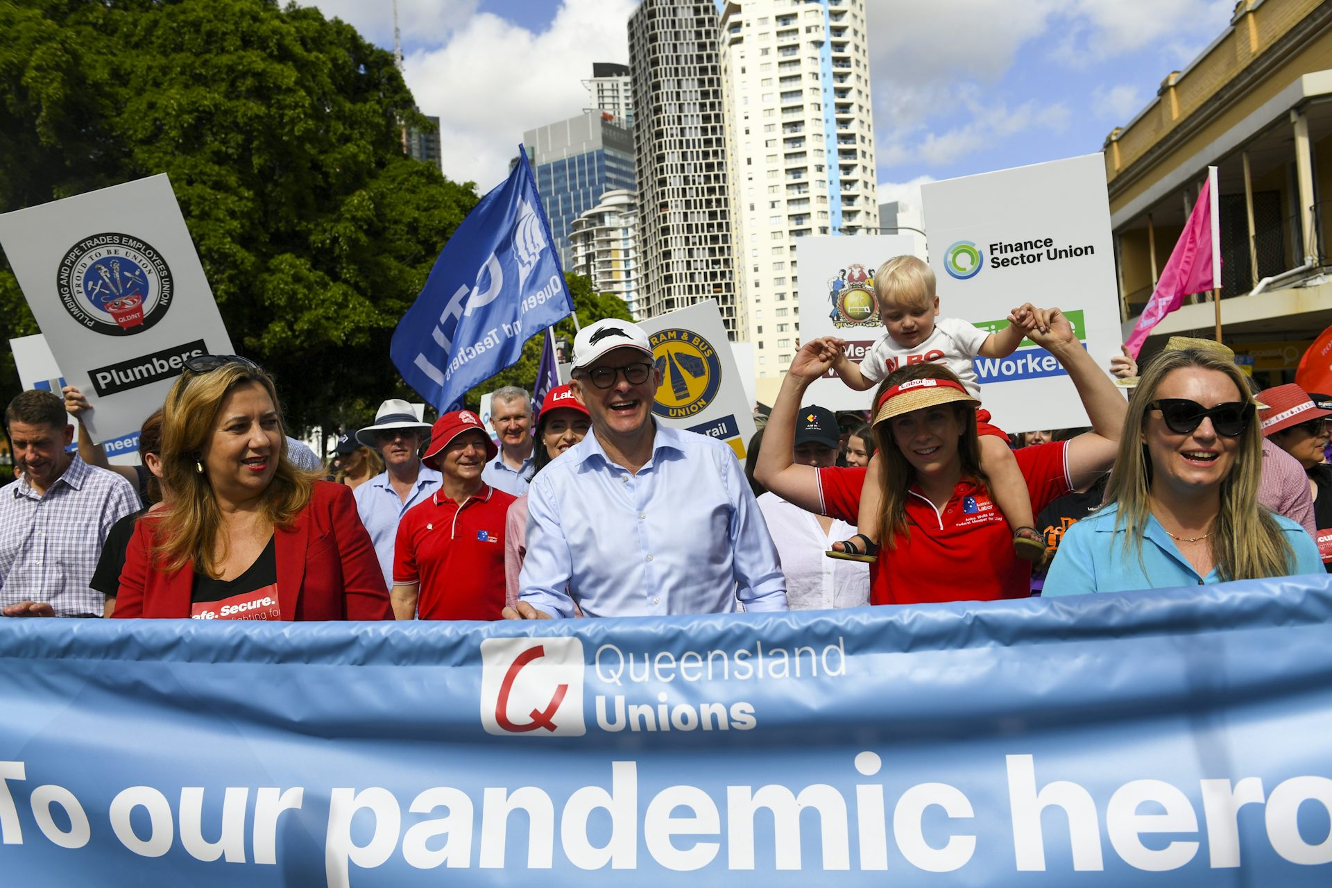 Anthony Albanese, centre, attends the Labour Day march in Brisbane on May 2 2022.