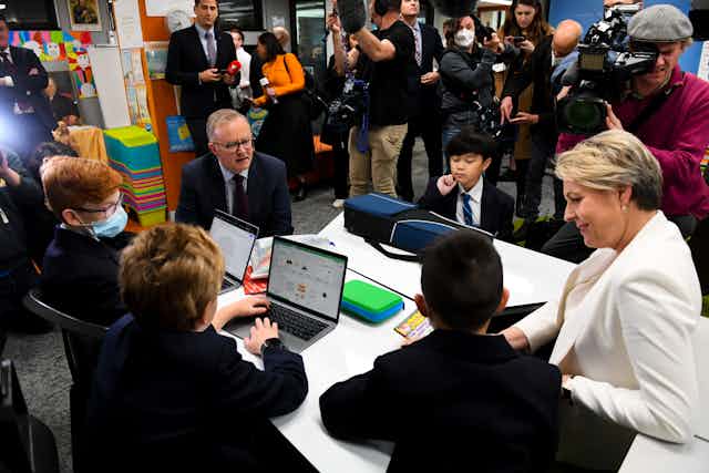 Anthony Albanese and Tanya Plibersek speak to schools students during the 2022 campaign.
