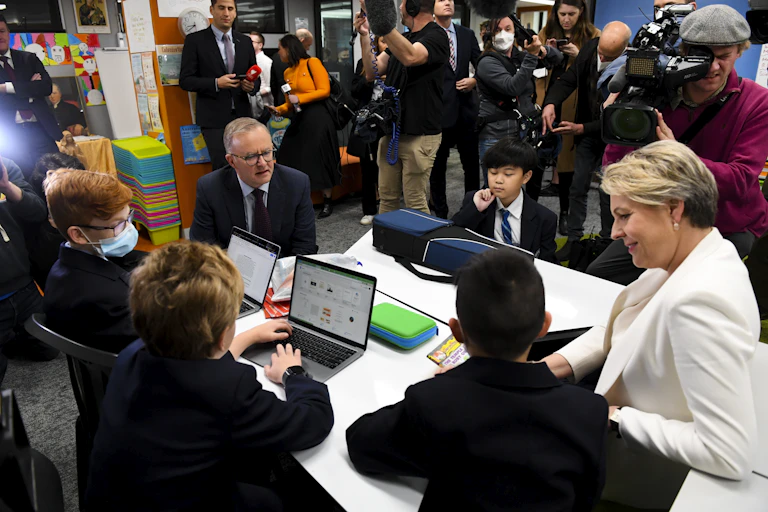 Anthony Albanese and Tanya Plibersek speak to schools students during the 2022 campaign.