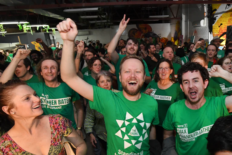 Greens supporters celebrating 2022