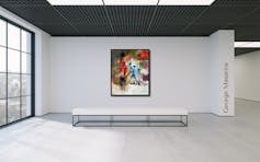 A painting on a wall is brightly coloured showing a figure reclining, faces emerging from the background.