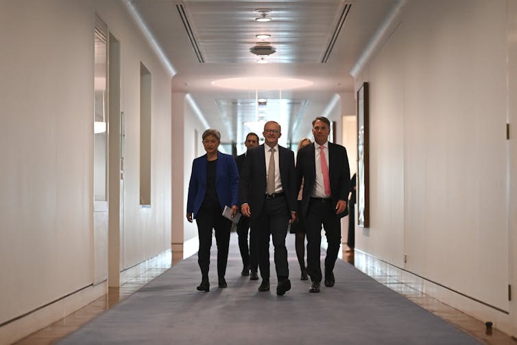 Penny Wong, Jim Chalmers, Anthony Albanese, Katy Gallagher and Richard Marles arrive for their first post-election parliamentary press conference.