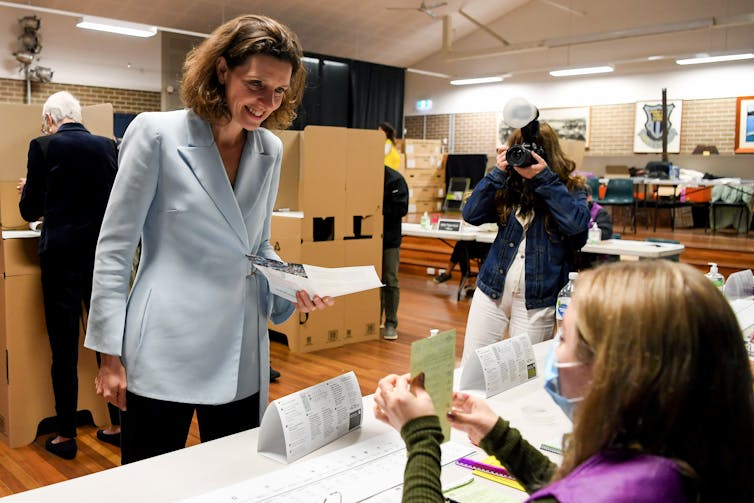 Independent candidate Allegra Spender arrives to vote on election day.