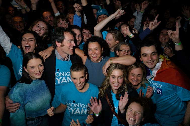 New Kooyong MP Monique Ryan with supporters on election night.