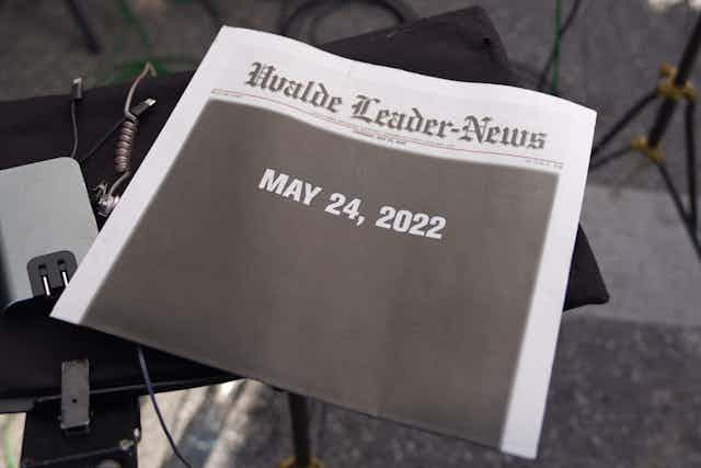 A newspaper named the 'Uvalde Leader-News' is shown with the date 'May 24, 2022' in white block print on top of a totally black front page.