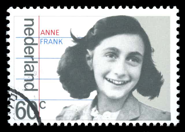 A Dutch stamp showing the face of Anne Frank.