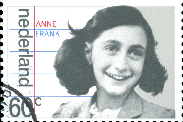 A Dutch stamp showing the face of Anne Frank.