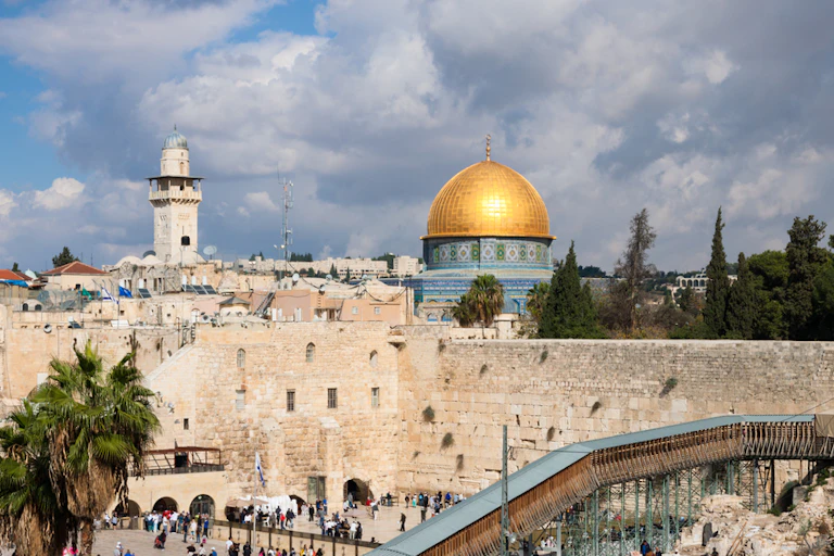 The ancient walls of Jersusalem with the Dome on the Rock visible.