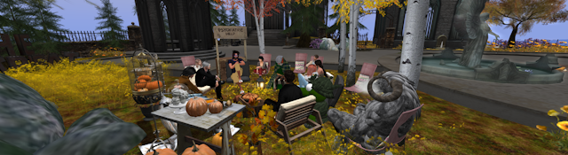 a computer-generated image  of people and mythical beasts sitting around an outdoor setting