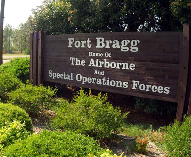A sign reading Fort Bragg shows the name of a Confederate general that the base is named. 
