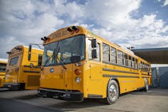 Yellow electric school buses