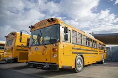 Yellow electric school buses