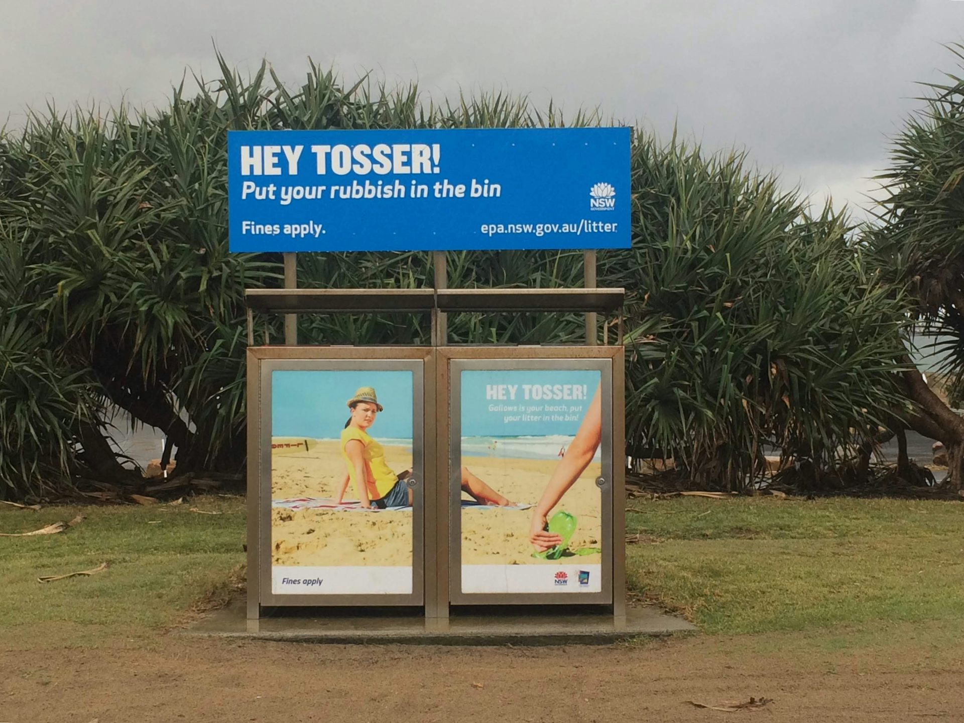 Rubbish bins with anti-littering sign