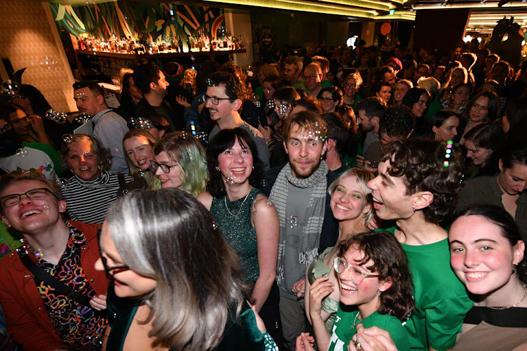 Greens supporters celebrate on election night.
