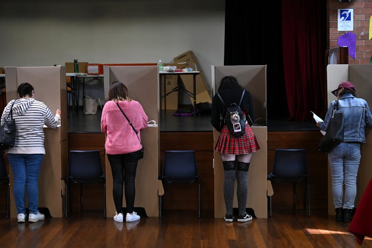 Voters at the polling booth on Election Day.