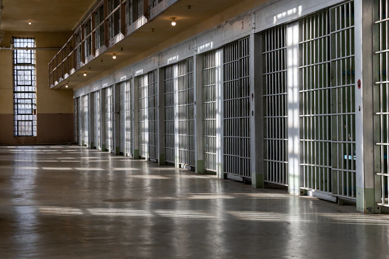 A row of empty jail cells